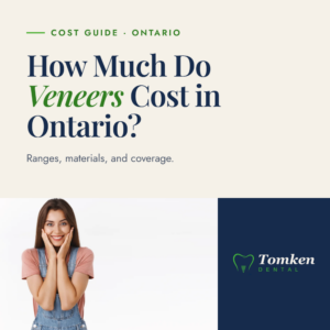Smiling woman with hands on cheeks - veneers cost guide for Ontario patients, Tomken Dental