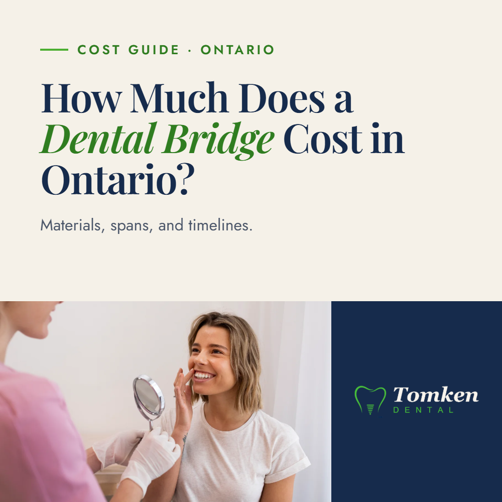 Dental assistant and smiling patient in the treatment chair - dental crown cost guide for Ontario, Tomken Dental