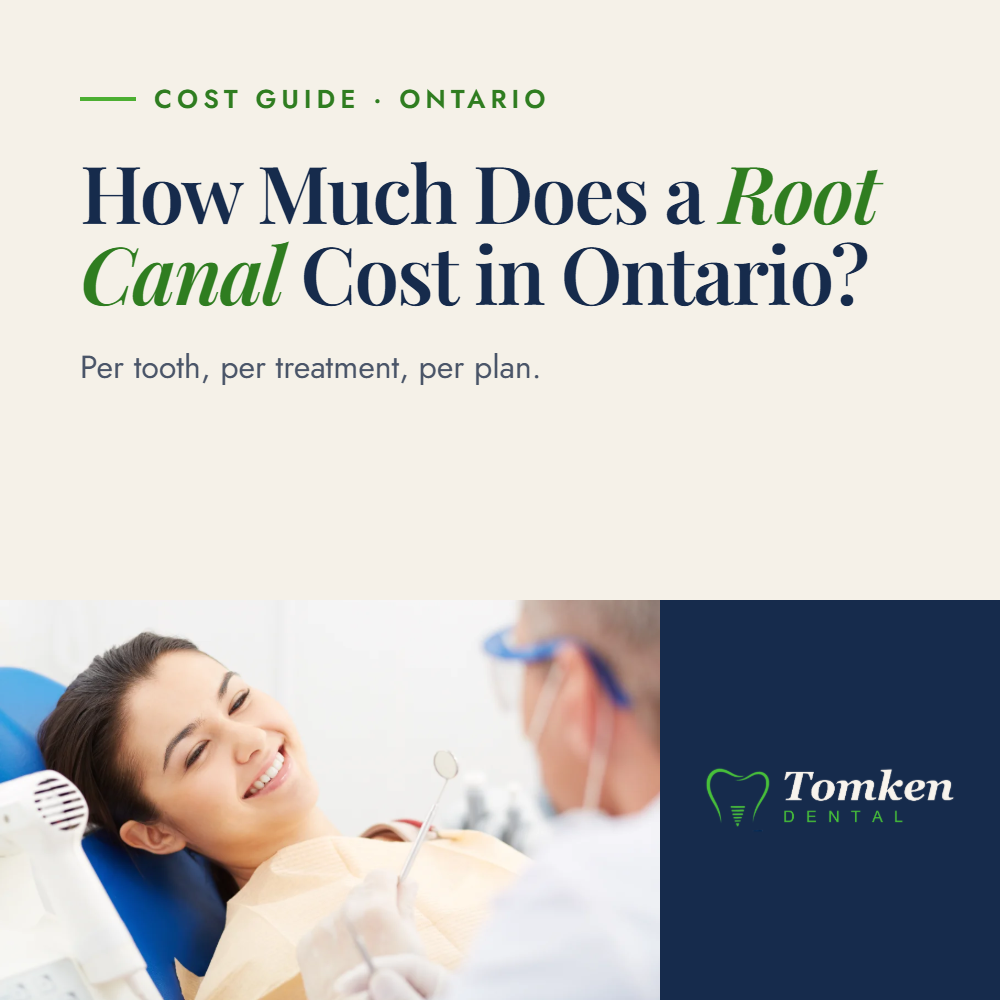 Smiling patient reclined in dental chair during a checkup - root canal cost guide for Ontario, Tomken Dental
