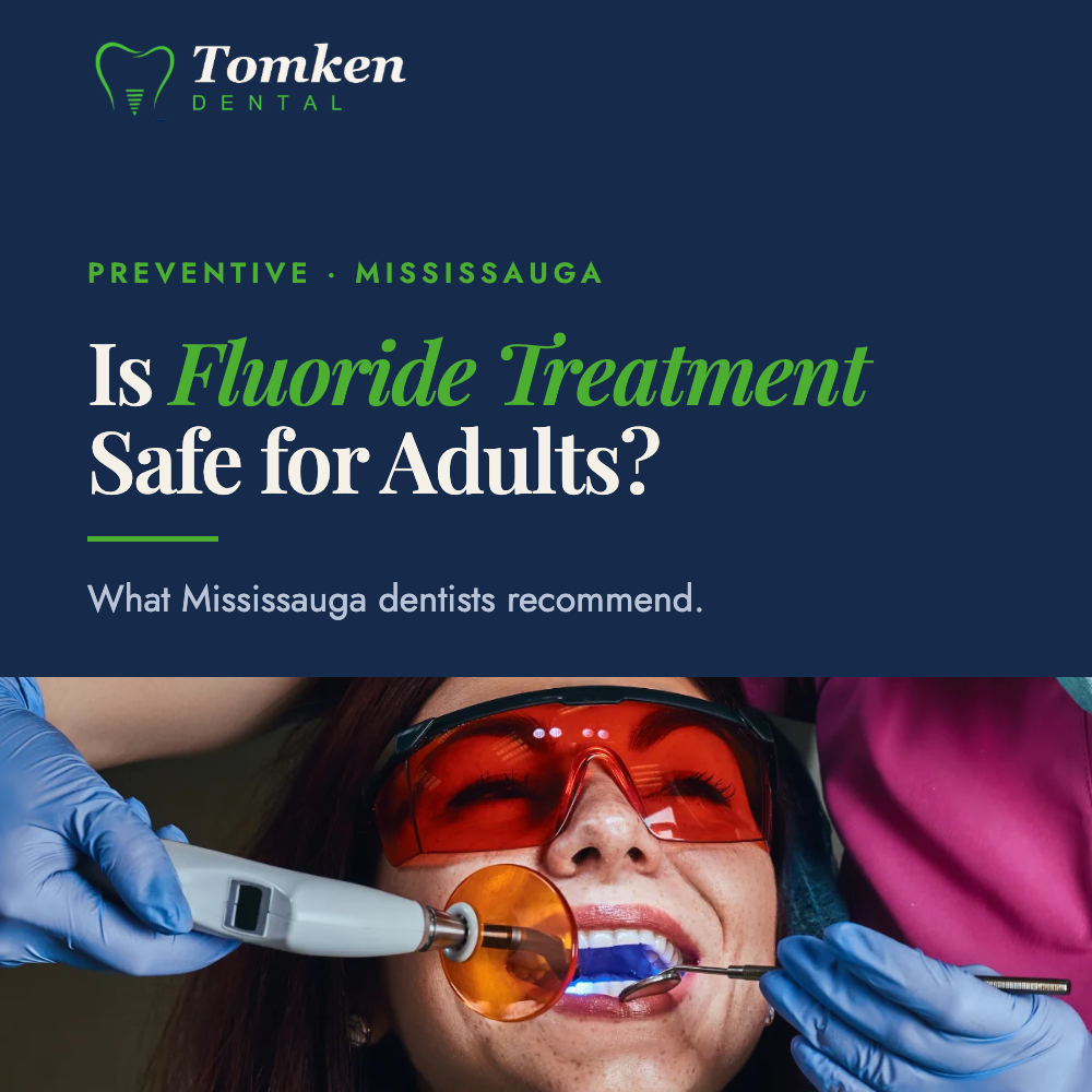 Dentist applying fluoride gel to a patient's teeth
